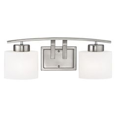 two light bathroom fixture with white glass shades on the sides and chrome finish, in an elegant