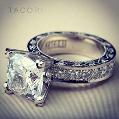 an image of two wedding rings with diamonds on them