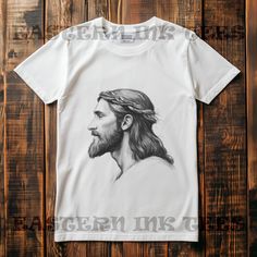 Design: Share your faith with this inspiring Jesus T-Shirt, featuring a beautiful and meaningful design. Ideal for those looking to express their Christian beliefs through fashion, this shirt combines faith and style. Perfect for everyday wear or as a thoughtful gift, this Jesus T-shirt will make a bold statement about your faith and values.  0123 SHIRT This classic unisex jersey short sleeve tee fits like a well-loved favorite. These t-shirts have-ribbed knit collars to bolster shaping. The shoulders are tapered for a better fit over time. Dual side seams hold the garment's shape for longer. - Made with 100% Airlume combed and ring-spun cotton - The retail fit that is perfect for casual and semi-formal settings - Bella+Canvas manufactures all its products in the US and internationally in Meaningful Design, Jesus Tshirts, Faith Shirt, Christian Apparel, Jesus Art, Jesus Shirts, Christian Clothing, Christian Shirts, Christian Faith