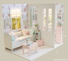 a doll house is shown with furniture and flowers on the walls, including a couch