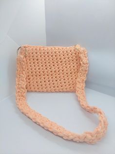 This vibrant orange crochet crossbody bag is a bold accessory that adds a pop of color to any outfit. Handcrafted from soft yarn, it features a lightweight design and a spacious interior, making it perfect for carrying your essentials. Ideal for casual outings, beach days, or festivals, this stylish bag combines functionality with a cheerful aesthetic. Casual Orange Crochet Bag With Adjustable Strap, Orange Crochet Bag For Everyday Use, Orange Crochet Rectangular Bag, Daily Use Orange Crochet Shoulder Bag, Orange Crochet Bag With Adjustable Strap For Everyday, Orange Crochet Shoulder Bag For Everyday Use, Everyday Orange Crochet Shoulder Bag, Rectangular Orange Crochet Bag, Handmade Orange Crochet Bag For Daily Use