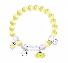 Elevate your accessory game with this adorable Pompompurin Beaded Bracelet. Featuring soft yellow beads and clear accents, this charming bracelet is adorned with three delightful charms: a slice of toast, a Pompompurin character, and a daisy flower. Perfect for fans of the sweet and playful Pompompurin, this bracelet adds a touch of cuteness to any outfit. Size: 14-17cm Pompompurin Bracelet, Pompompurin Clay Ring, Pompompurin Shirt, Yellow Pompompurin, Pompompurin Items, Pitcairn Islands, Daisy Flower, Caribbean Netherlands, Gift Box