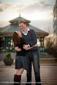 a man and woman standing next to each other