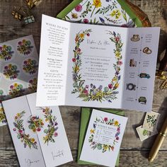 the wedding stationery is laid out on top of each other, with matching cards and envelopes