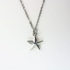 ♥ Star Necklace Sliver Star Charm Necklace Star Pendant Birthday Gift Mother's Gift Christmas Gift Personalized Gift ♥ This is a beautiful Star charm with ♥ You will receive 1 necklace ♥ Star charm 16x14x4 mm ♥ Stainless steel chain 18 inches ♥ We strive for next day shipping, but we do not ship on Saturdays, Sundays, and Holidays. It may sometimes take a bit longer when we have unusually large volume of orders. Thank you for your patience! ♥♥ For more details on shipping guideline and other pol Silver Star Charm Necklace For Anniversary, Silver Star Charm Necklaces For Anniversary, Silver Star Charm Jewelry For Birthday, Silver Star-shaped Jewelry For Birthday, Silver Star-shaped Birthday Jewelry, Silver Birthday Jewelry With Star Charm, Silver Jewelry With Star Charm For Birthday, Silver Star Shaped Jewelry For Birthday, Silver Necklace For Birthday And Christmas