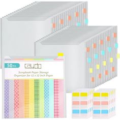 50 sheets of scrapbook paper, each with different colored squares on the front and back