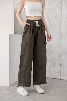 These wide-leg cargo pants are just what you need to get through the day. These baggy pants are perfect for running errands, heading to class, or relaxing at home. Made from a lightweight material, these pants will be your new go-to. Add a pop of color with a shirt or button-down top and pair it with your favorite sneakers.
Gender: WomenMaterial: PolyesterClothing Length: Full LengthClosure Type: Elastic Waist Utility Style Cotton Sweatpants For Outdoor Activities, Wide Leg Parachute Pants With Pockets For Outdoor Activities, Trendy Wide Leg Khaki Cargo Pants, Wide Leg Cargo Jeans With Multiple Pockets For Outdoor, Wide Leg Cargo Pants For Outdoor Activities, Wide Leg Cargo Jeans For Outdoor Activities, Baggy Full-length Utility Parachute Pants, Relaxed Fit Cargo Jeans For Spring Outdoor, Relaxed Fit Wide-leg Utility Cargo Pants