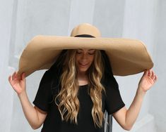 "Black Sunhat, Giant Brim Hat, 12 Inch Brim Straw Hat, Extra Wide Brim Hat, Summer Hat For Women, Giant Sunhat, Gift For Women Giant 12 inch brim Sunhat, sewn from toyo straw. ` Fits up to size 22.5 inches head circumference, with an inside drawstring to adjust the size. A silk/rayon chiffon scarf is included, serving as ties to keep this giant hat on your head! Or leave untied and let them hang loose. You can also buy the hat without grommets and scarf. The hat weighs 1.6 pounds, so it is a bit Beach Sun Hat For Kentucky Derby, Kentucky Derby Beach Cap Sun Hat, Black Sunhat, Wide Brim Hat Summer, Far Rockaway, Summer Hats For Women, Purple Hats, Hat Summer, Hang Loose