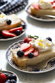 three plates with cake and fruit on them