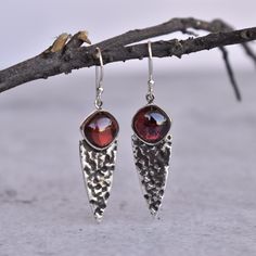 ✦ Introducing our natural red garnet earrings! This unique bohemian inspired design features healing stones that is as unique and real as you are.. Our natural red garnet earrings are perfect for anyone who loves celestial and meaningful jewelry. With their simple and elegant design, these earrings are truly one-of-a-kind. Garnet is known as a healing stone, making these earrings even more special. The recipient is sure to cherish them for years to come! 💎  Please Note As with all Natural Gemst Bohemian Burgundy Jewelry As Gift, Bohemian Burgundy Jewelry Gift, Garnet Gemstone Earrings, Garnet Gemstone Drop Earrings, Handmade Burgundy Earrings For Gift, Silver Garnet Jewelry With Natural Stones, Garnet Drop Earrings With Matching Set, Red Sterling Silver Earrings With Natural Stones, Garnet Drop Earrings As Gift