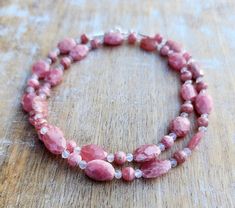 Rhodochrosite Gemstone Necklace, Pretty Pink Necklace, Handmade Necklace, OOAK Necklace, Light PInk Necklace, 19 Inch Rhodochrosite Necklace Pretty pink oval shaped, faceted rhodochrosite gemstones, small rondelle shaped pink rhodochrosite gemstones, and tiny rainbow moonstone gemstones make up this gemstone beaded necklace.  The pink color in these natural gemstones is absolutely lovely!  They have not been treated to enhance color or clarity in any way. The faceted, oval shaped rhodochrosite g Light Pink Necklace, Rhodochrosite Necklace, Moonstone Gemstones, Pink Rhodochrosite, Gemstone Beaded Necklace, Moonstone Earrings, Pink Necklace, Silver Spring, Opal Necklace