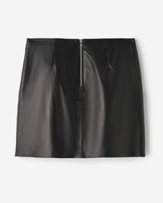 This wardrobe staple deserves a spot in your closet. Our Short Leather Skirt is a tried-and-true favourite that pairs with everything from t-shirts to button downs. Designed and handcrafted in Canada in our factory in Toronto Fitted short skirt Front and back darts Exposed center back zipper Raw edge waist and hem Fully lined MATERIALS Body: 100% leather Lining: 100% viscose twill LOOK AFTER ME Dry clean only | Roots Short Leather Skirt Dress in Black Short Leather Skirt, Short Leather Skirts, Mens Leather Accessories, Slim Sweatpants, Kids School Backpack, Sweat Dress, Graphic Tee Dress, Slim Fit Dresses, Active Leggings