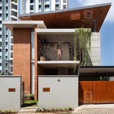 an apartment building with wooden doors and windows