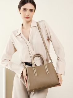 Gender: Women Type: Purse, Shoulder Bag Features: Adjustable Strap, Inner Pockets Main Materials: Cowhide Lining: Polyester Type of Closure: Zipper Style: Casual, Daily, Stylish Size: Length: 29 cm / 11.42 " Width: 12cm / 4.72 " Height: 21.5 cm / 8.46 " Khaki Satchel With Double Handle For Daily Use, Office Shoulder Bag With Solid Color And Handles, Khaki Double Handle Satchel For Daily Use, Versatile Beige Satchel For Shopping, Khaki Satchel With Large Capacity, Khaki Leather Satchel With Adjustable Strap, Khaki Shoulder Bag With Double Handles, Khaki Large Capacity Shoulder Satchel, Large Capacity Khaki Shoulder Satchel