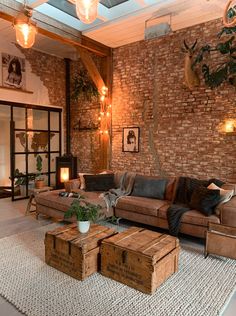 a living room filled with lots of furniture next to a wall covered in plants and lights