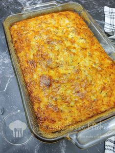 a casserole dish with cheese and meat in it