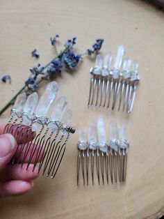 "This clear quartz hair comb features five (5) natural quartz crystals measuring between 1/2\" - 1.5\" tall. The crystals are wire wrapped securely on a 2\" wide silver hair comb. Each comb is unique, as natural crystals vary in shape, size and clarity.  This boho crystal hair comb is one of a kind! Perfect for weddings, photoshoots, dress up, festivals, or any time you want to add a bit of magic to your look. This Crystal Hair comb slides into the hair comfortably, and features rounded comb teeth ends.  Crystal hair combs can be styled with a bun, ponytail, side twist, updo, braids, and in many creative ways!  Clear quartz crystal is a high vibrational stone - carrying or meditating with a Clear Quartz crystal opens the mind and heart to higher guidance, allowing healing and spiritual gro Wedding Hairstyles With Crystals, Crystal Hair Accessories Diy, Diy Hair Comb Accessories, Whimsigoth Wedding, Boho Wedding Hair Accessories, Round Comb, Side Twist, Updo Braids, Twist Updo