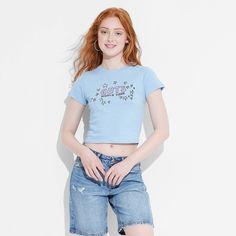 Take your casual style up a notch with this Women's Olivia Rodrigo Guts Short Sleeve Graphic Baby T-Shirt – Blue. With the ‘Guts World Tour’ text on the front, this tee gives a laid-back vibe. It is made from lightweight and breathable fabric that feels comfortable against your skin. Wear this t-shirt with your favorite pair of jeans for a perfectly relaxed look. Diy Olivia Rodrigo Shirt, Olivia Rodrigo Crop Top, Olivia Rodrigo Butterfly Top, Olivia Rodrigo T Shirt, Olivia Rodrigo Baby Tee, Baby Fits, Boyfriend T Shirt, Dress With Sneakers, Blouse And Skirt