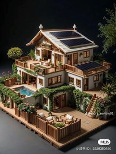 a model of a house with solar panels on the roof