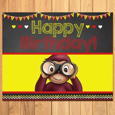 a happy birthday card with a monkey looking through binoculars