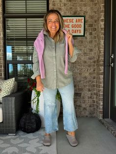 Create a chic and layered look with a lilac sweater, green button-down, classic jeans, and comfortable clogs. Finish the outfit with a gold necklace for a touch of elegance. Perfect for casual outings or a stylish day at work, blending comfort with a pop of color. Lilac Sweater, Classic Jeans, Green Button, Layered Look, Blending, Clogs, Button Downs, Lilac, Color Pop