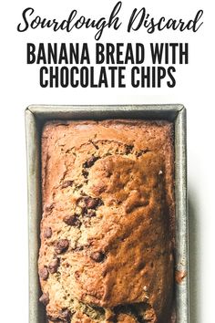 banana bread with chocolate chips in a metal pan on a white background text reads, sourdough biscuit banana bread with chocolate chips