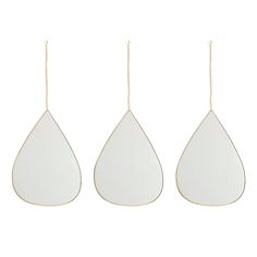 three pieces of white leather hanging from gold chains on a white background, each with a tear shaped ornament