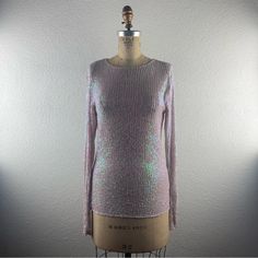 Free People L M Gold Rush Iridescent Sequin Crew Neck Long Sleeve Stretch Blouse. Fits Approximately : Medium To Large; Label States M - Relaxed Fit; Garment Has Stretch. Bust : 30” Unstretched Hip : 30” Unstretched Sleeve : 26” Length : 25” Nwt. Excellent Condition. Never Worn. 0000 New To Poshmark? Use Code "Shesabettie" For $10 Off Your First Purchase! Metallic Long Sleeve Top With Sequins, Trendy Iridescent Long Sleeve Outerwear, Metallic Long Sleeve Glamorous Blouse, Fitted Long Sleeve Metallic Blouse, Free People Gold Rush Long Sleeve, Blouse Fits, Iridescent Sequin, Gold Rush, Free People Tops