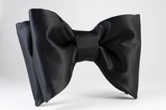 "Men Pre Tied Oversized Black Shiny Silk Bow Tie Groom Wedding Bowtie New Way Creation Design pre tied and adjustable silk handmade bowtie Color: Black & other option - please see before checkout. Fabric type: Satin Silk (shiny) Dimension: 1. Adult size: 4.75/3.15\" (12 / 8 cm), 2. Child size: 3.95/2.36\" (10/6 cm) or 3. Infant size: 3.15/1.57\" (8/4 cm) Adjustable strap: yes, up to 18\" aprox (for adult). Please let me know if you need it longer We offer free of charge custom initials visib Pre-tied Satin Bow For Black Tie Events, Elegant Bow Tie With Decorative Bow For Groom, Elegant Adjustable Bow Tie For Groom, Classic Pre-tied Ties For Wedding, Classic Pre-tied Bow For Wedding, Classic Pre-tied Wedding Tie, Classic Wedding Ties With Decorative Bow, Classic Wedding Tie With Decorative Bow, Elegant Black Satin Tuxedo