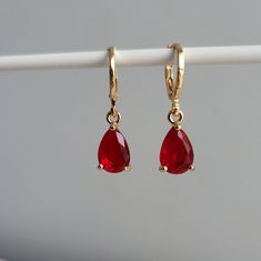 Ruby Red & Crystal Teardrop Teardrop Jewel Huggie Hoop Earrings, 14k Gold Plated Earrings, Vintage Style Earrings, Victorian Earrings  Product specifications: * Material: 14K Gold Plated Brass * Size Each charm measures 1 cm x 0.7cm Earring Options: * 8mm inner diameter hoops * 10mm inner diameter hoops Packaging and Gifts: * All pieces of jewellery are set on a card in a mesh jewellery pouch  Shipping: * All Australian orders will be shipped out within 1 - 3 days by standard untracked letter po Victorian Earrings, Vintage Style Earrings, Red Crystals, Huggie Hoop Earrings, Earrings Vintage, Style Earrings, Gold Plated Earrings, Jewelry Earrings Hoops, Jewelry Pouch