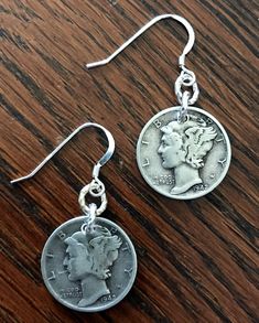 "We are proud to offer up for your consideration these lovely handmade up-cycled Sterling Silver Earrings! You can also choose from a variety of custom hand stamped gift boxes! See below for your options! PLEASE NOTE! THE PICTURES SHOWN ARE FOR REFERENCE ONLY! I UTILIZED DIMES FROM THE YEAR 1942, BUT YOU CAN SELECT ANY YEAR AVAILABLE FROM THE DROP DOWN MENU! THE NATURAL PATINA CAN VARY GREATLY BUT CONDITION WILL BE VERY SIMILAR. If you would like to see the exact coins I will be using for your o Retro Sterling Silver Jewelry For Gift, Retro Sterling Silver Jewelry Gift, Vintage Dangle Earrings For Anniversary, Adjustable Retro Nickel-free Jewelry, Retro Round Jewelry With Vintage Charm, Vintage Nickel-free Dangle Jewelry, Nickel-free Vintage Dangle Jewelry, Vintage Jewelry With Ear Wire For Anniversary, Retro Nickel Free Jewelry For Gifts