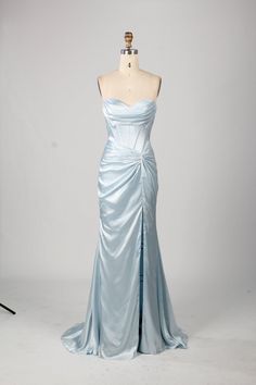 Get ready to turn heads at Prom 2024 with the Kiya Strapless Sky Blue Satin Fitted Prom Dress by Jessica Stuart! This stunning dress features a playful strapless design and a bold teal color that will make you stand out from the crowd. Perfect for a night of fun and unforgettable memories. High Leg Split Lace up Back Strapless Available in Sky Blue or Teal Silk Dresses For Prom, Ice Blue Formal Dress, Wrap Prom Dress, Colourful Prom Dress, Light Blue Prom Dress Aesthetic, Where To Get Prom Dresses, Silk Prom Dresses, Night Prom Dress, Bridesmaids Dresses Blue