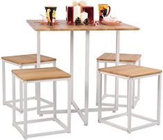 three stools and a table with drinks on it