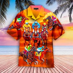 an image of horses and jockeys on the beach printed on a t - shirt