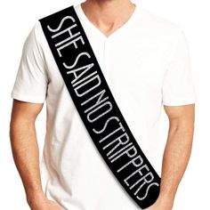 a man wearing a black and white sash with the words st louis street on it