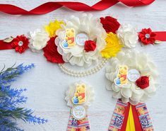 some red, white and yellow flowers are on display