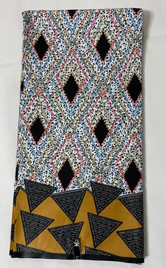 Material: African Fabric / wax print fabric  /100% Cotton / African wax print  / Ankara  Fabric, printed by Woodin. ( Per Yard) Texture: Waxed Width: 48 inches  Length: 36 inches  Multicolored: White, Black, Deep Pink, Gold , Peacock ‚Salmon, African Wax Print is commonly used for traditional wedding attire, African weddings, and other ceremonies. This fabric is also lovely for making masks and hair accessories, purses, and a variety of other crafts and fashion design items. This African print is washable in the machine (with specific instructions) with many varieties of uses for clothing, crafts, etc. Disclaimer: Colors may appear different from photos due to lighting. Washing Directions (in washing machine or hand wash): 1. Wash cold or wash somewhere below 30 degrees, please do not exce Cotton Fabric With Graphic Print, Patterned Cotton Fabric With Graphic Print, Patterned Batik Print Fabric, Printed Multicolor Ankara Fabric, Multicolor Printed Ankara Fabric, Patterned Cotton Floral Print Digital Prints, Cotton Batik Print Fabric, Cotton Floral Print Digital Prints, Ankara Fabric With Geometric Pattern Prints