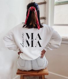 Hello and welcome to my shop!  This sweatshirt is a fun gift for all dance moms.  There is a cute ballet dancer graphic on the upper left front and larger dance mama graphic on the back. All print in this listing is in black. Everything is made to order so if you have any questions please feel free to contact me and I'd be happy to help. **Sweatshirt Features** Without side seams. Knit in one piece using tubular knit, it reduces fabric waste and makes the garment more attractive.  Ribbed knit co Dance Mom Essentials, Dance Mom Competition Outfit, Dance Mom Outfits Style, Dance Mom Sweatshirt, Dance Sweatshirt Ideas, Dance Mom Shirts Design, Dance Teacher Shirts, Dance Mom Outfits, Dance Shirts Sayings