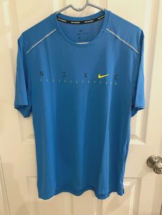 NWT Mens Nike Dry-Fit Running Training Short Sleeve T Shirt  Size: L Color: Blue  Standard Fit  Brand new and 100% authentic! Nike Mens, Training Shorts, Running Training, Short Sleeve T Shirt, Nike Running, Dri Fit, Nike Men, Men's Polo Shirt, Polo Ralph Lauren