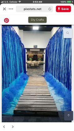 an image of a room with blue water on the floor and walls that look like waterfalls