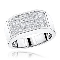 a white gold ring with diamonds on the sides and two rows of stones in the middle