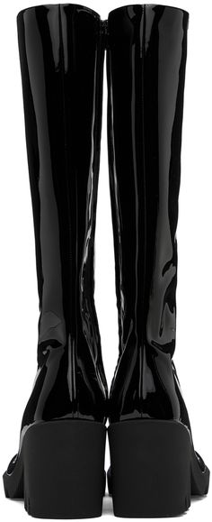 Knee-high patent leather boots in black. · Square toe · Zip closure at inner side · Buffed leather lining · Textured rubber midsole and block heel · Treaded rubber sole · Heel: H3.5 Supplier color: Black Sleek Glossy Boots For Evening, Sleek Glossy Finish Evening Boots, Luxury Patent Leather High Heel Knee-high Boots, Luxury Patent Leather Knee-high Boots For Formal Occasions, Luxury High Heel Patent Leather Knee-high Boots, Luxury High Heel Knee-high Boots In Patent Leather, Evening Patent Leather Knee-high Heeled Boots, Evening Knee-high Patent Leather Heeled Boots, Elegant Fitted Patent Leather Platform Boots