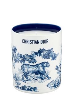 a blue and white cup with a tiger on it