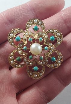 Size: 1.25x1.3" Weight: 8.5 grams Marked: 14k Luxury Turquoise Brooches, Turquoise Brooch For Formal Occasions, Luxury Turquoise Brooches For Gift, Victorian Turquoise Jewelry For Formal Occasions, Turquoise Cabochon Brooch As A Gift, Turquoise Cabochon Brooch For Gift, Elegant Turquoise Brooches For Collectors, Turquoise Brooch Jewelry Gift, Pearl Brooch