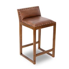 a brown leather bar stool with wooden frame and studded backrests on an isolated white background