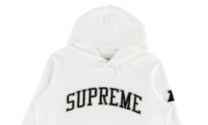 The Supreme Raiders ‘47 Hoodie is part of a collaborative assortment that launched with the Supreme Spring/Summer 2019 collection.  On the front of the cotton hooded sweatshirt is a Supreme logo across the chest.  A large Raiders logo flanks the back and an AFC logo appears on the left arm.  The hoodie is appropriately shaded in white, black, and silver Raiders colors.  With an overwhelming number of white hoodies on the market, this particular one should be a no-brainer for Raiders fans and anyone who likes the team's rebel spirit. Raiders Logo, Supreme Logo, Raiders Fans, Stadium Goods, The Supreme, Black And Silver, White Hoodie, Summer 2019, Hooded Sweatshirt