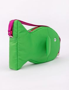 Find a new friend in this super plushy Fish Purse! This bag is so comfy and soft to wear, you'll be making it your daily driver. The inside is super roomy and can fit everything you need. Store small items in the two inside pockets. The grommet eye is the perfect size to thread your phone charger through to keep your phone charged and on hand! Hang your keys or our matching Fish Keychains off the double zipper pulls or the paracord loops on the head & tail of the bag. Adjust the strap to your pe Playful Green Shoulder Bag For School, Playful Satchel Bag For Travel, Playful Everyday Bag With Removable Pouch, Playful Shoulder Bag With Removable Pouch, Playful Shoulder Bag With Adjustable Strap, Playful Green Shoulder Bag For Everyday, Playful Satchel Bags For Everyday Use, Playful Satchel For Everyday Use, Playful Everyday Satchel Bag