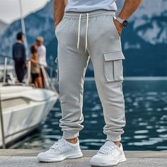 Season:Spring   Fall,Winter; Fabric:Polyester; Gender:Men's; Style:Sports,Fashion; Occasion:Daily,Casual,Outdoor; Fit Type:Regular Fit; Function:Warm,Comfort; Waistline:Mid Waist; Pattern:Plain; Design:Multi Pocket,Elastic Waist,Drawstring; Pants Type:Joggers,Sweatpants,Trousers,Fleece Pants,Cargo Sweatpants; Fly Type:Drawstring,Elasticity; Front page:FF; Listing Date:09/12/2024; Hips:null; Length:null; Waist:null; Pants Length:Full Length Joggers For Men, Cargo Sweatpants, Style Sweatpants, Style Sportif, Pants Cargo, Winter Fabric, Pants Length, Sports Fashion, Mens Joggers