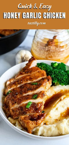 a plate with chicken, mashed potatoes and broccoli next to a jar of honey garlic sauce