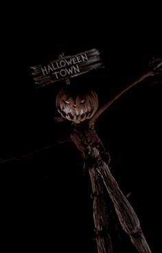 a creepy pumpkin with the words halloween town written on it